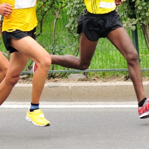 Marathon,Runners,Running,On,City,Road